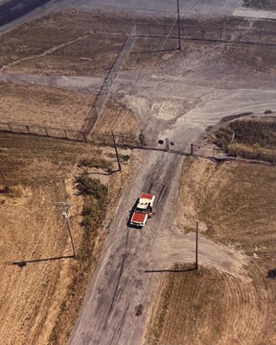 aerial view of Seneca Army Depot driveway with car